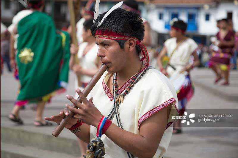 Peruvian boy with musical instrument