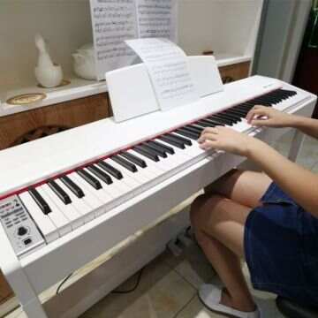 孩子学琴是买钢琴还是买电钢琴？